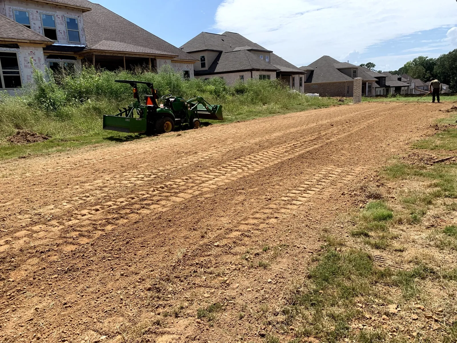 Yard regrading for positive drainage